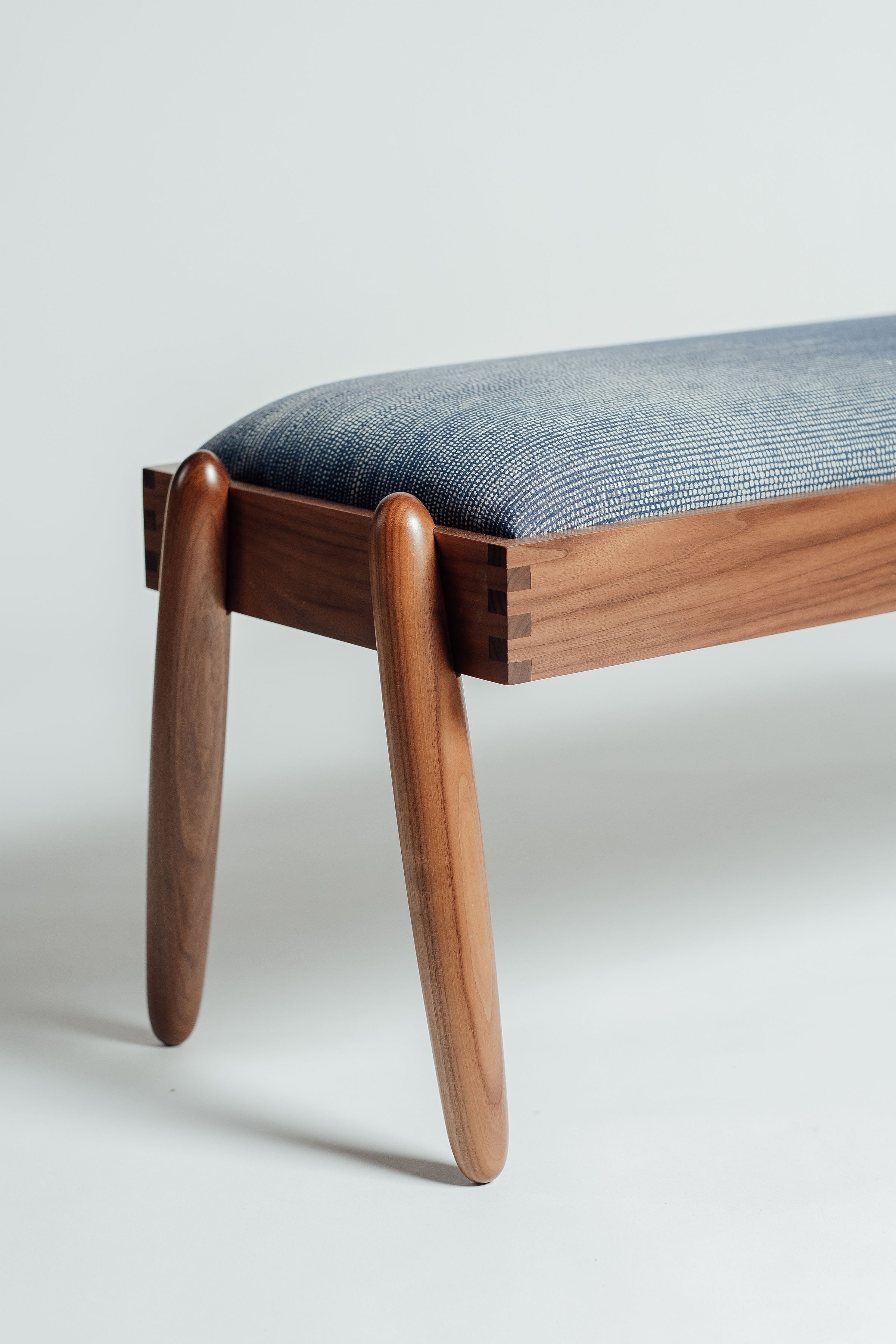 Solomon midcentury modern upholstered walnut wood bench handcrafted by Hunt & Noyer in Michigan