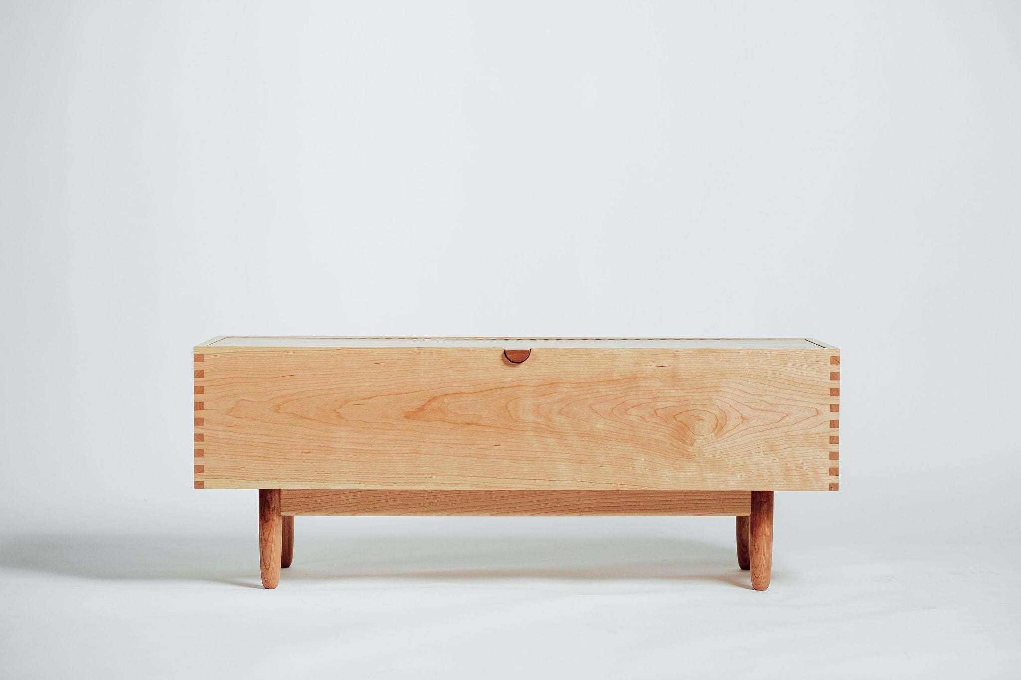 Haven midcentury modern cherry wood blanket chest handcrafted by Hunt & Noyer in Michigan